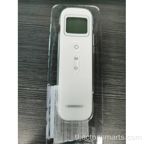 Ang thermometer ng plastik sa unahan / pulso